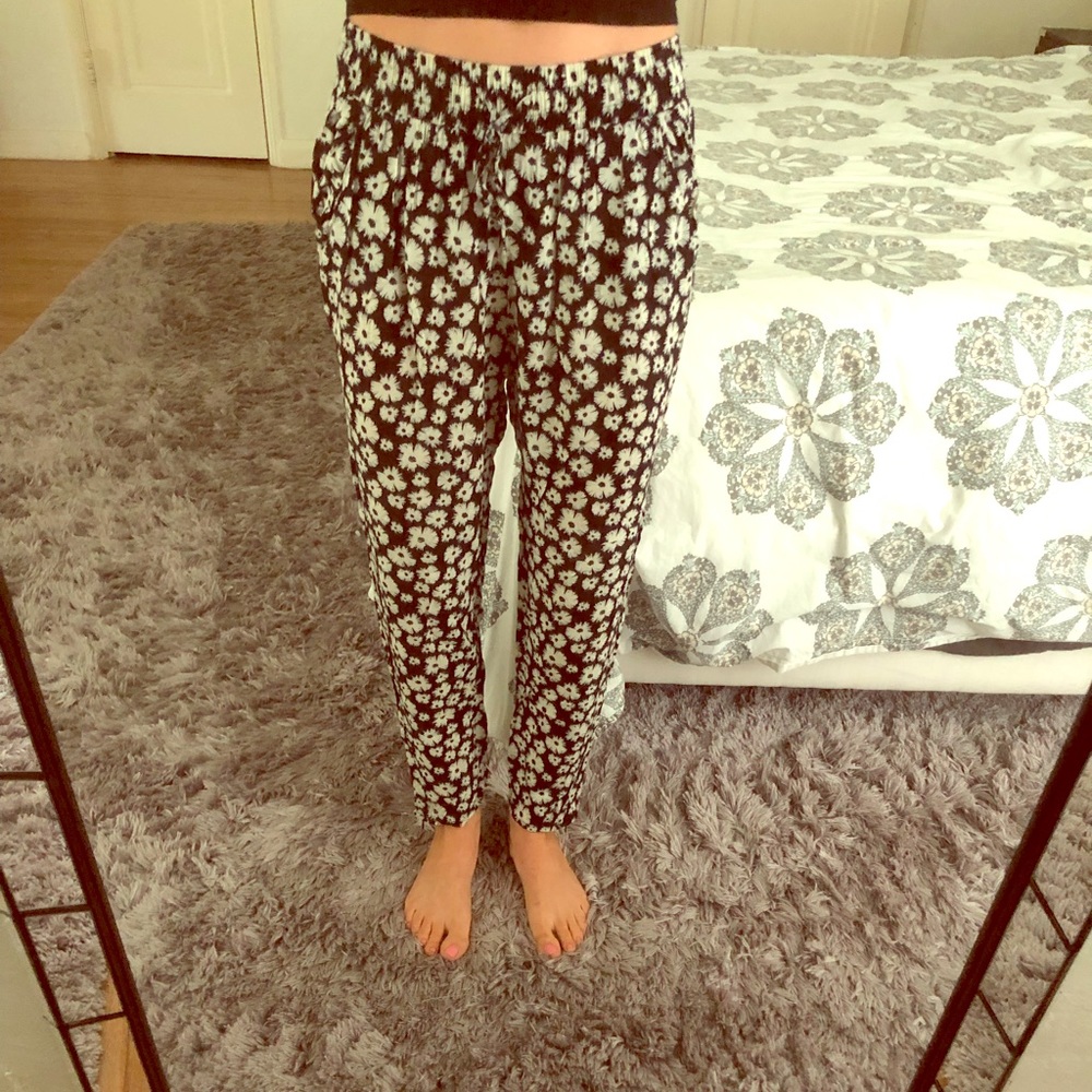 Black pants with white flowers